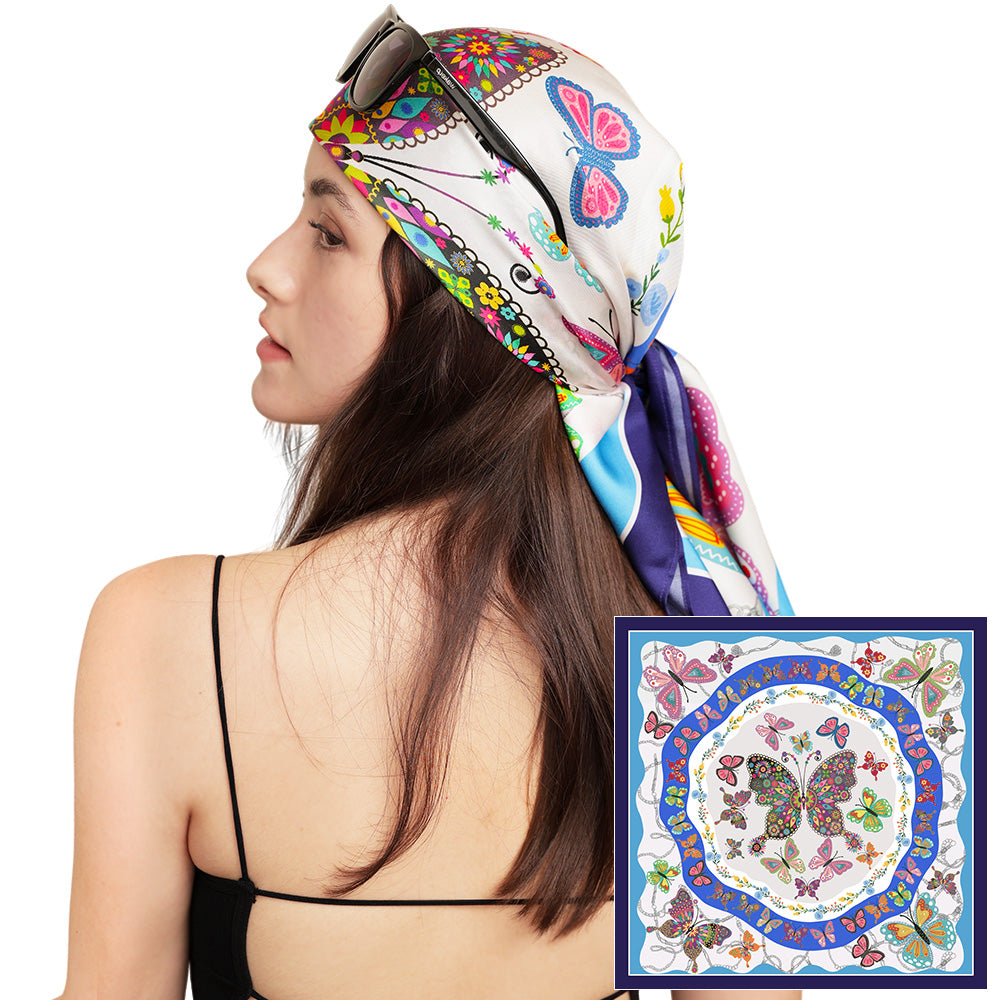 Model wearing the colorful butterfly silk scarf as a head wrap