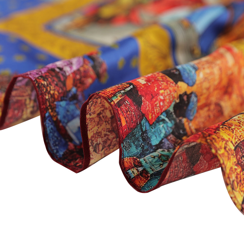 Close-up of the edge of the colorful silk scarf
