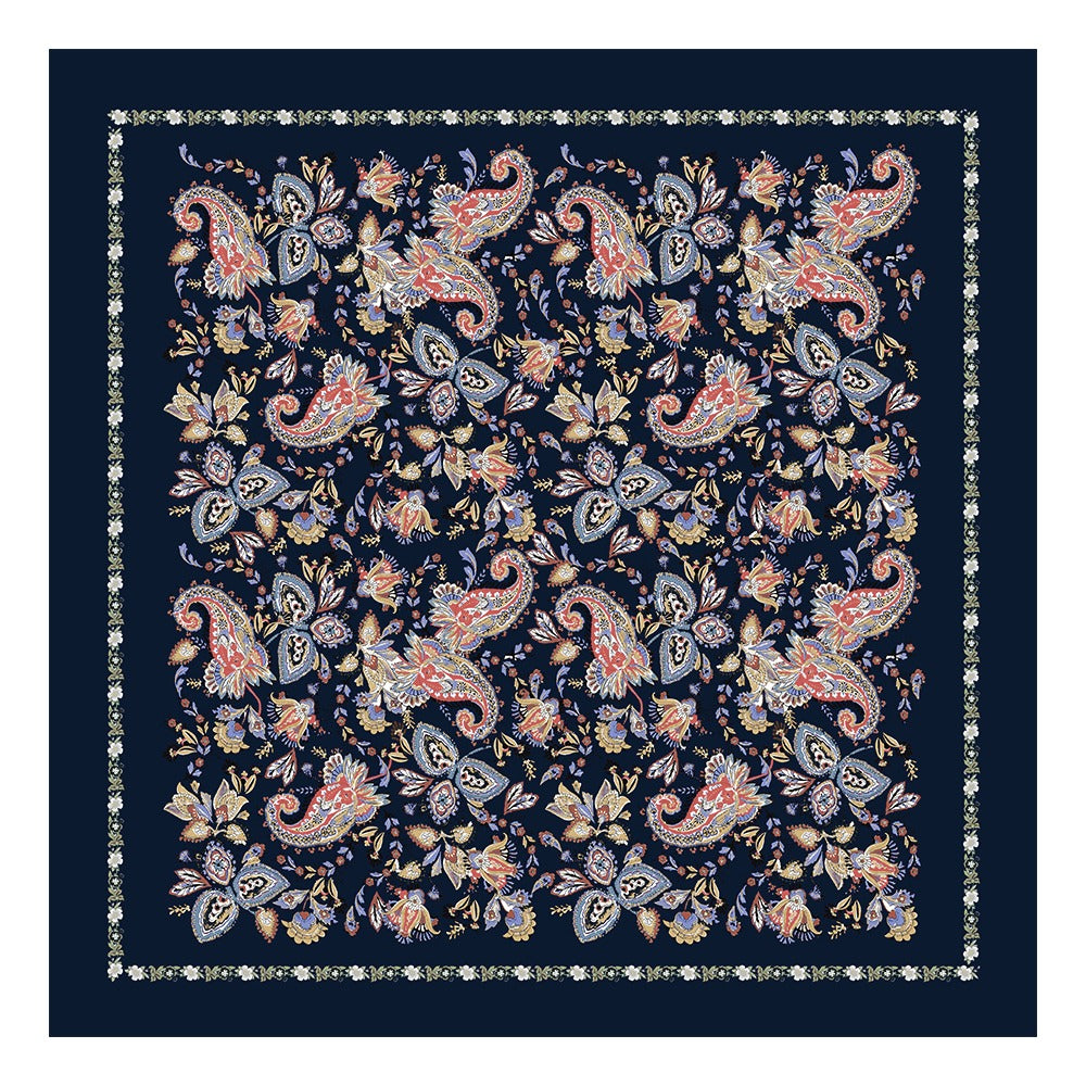 Navy silk square scarf with colorful paisley and floral print laid flat
