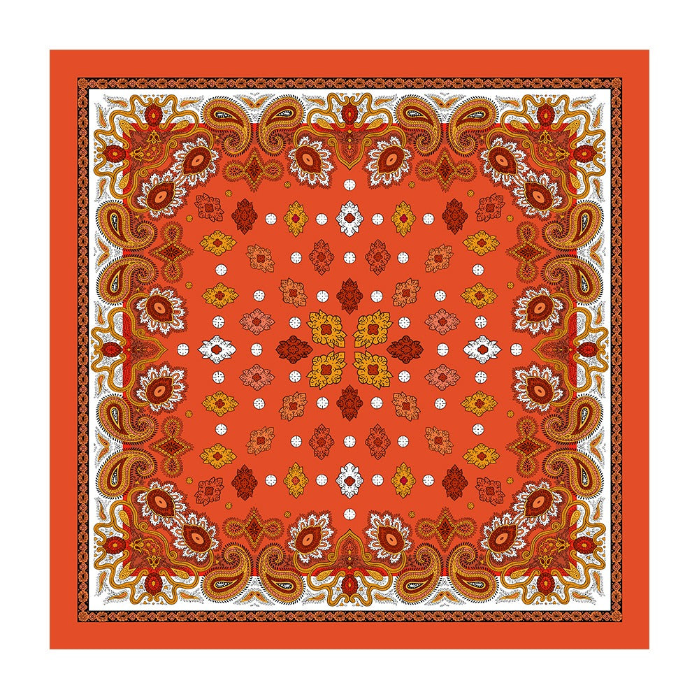 Orange silk square scarf with gold paisley and geometric floral print laid flat