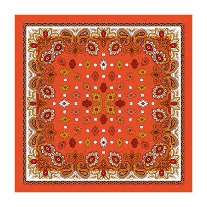 Orange silk square scarf with gold paisley and geometric floral print laid flat