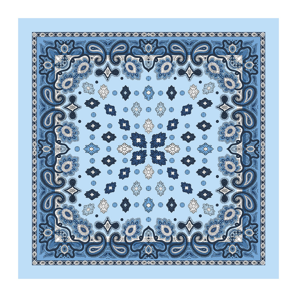 Light blue silk square scarf with navy paisley and geometric floral print laid flat