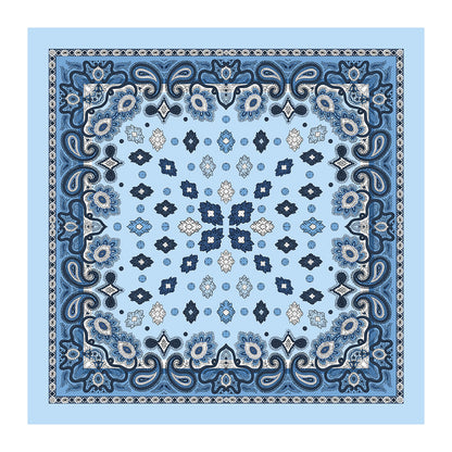 Light blue silk square scarf with navy paisley and geometric floral print laid flat