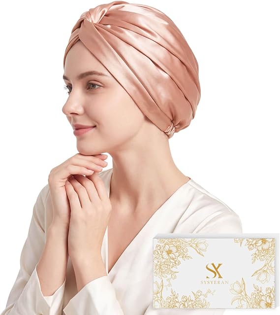 Rose gold mulberry silk sleep bonnet on model with gift box