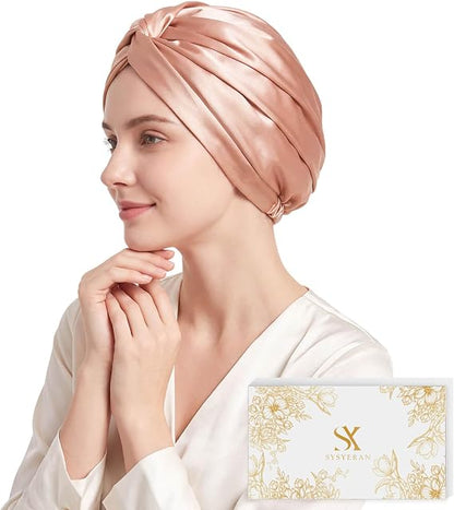 Rose gold mulberry silk sleep bonnet on model with gift box
