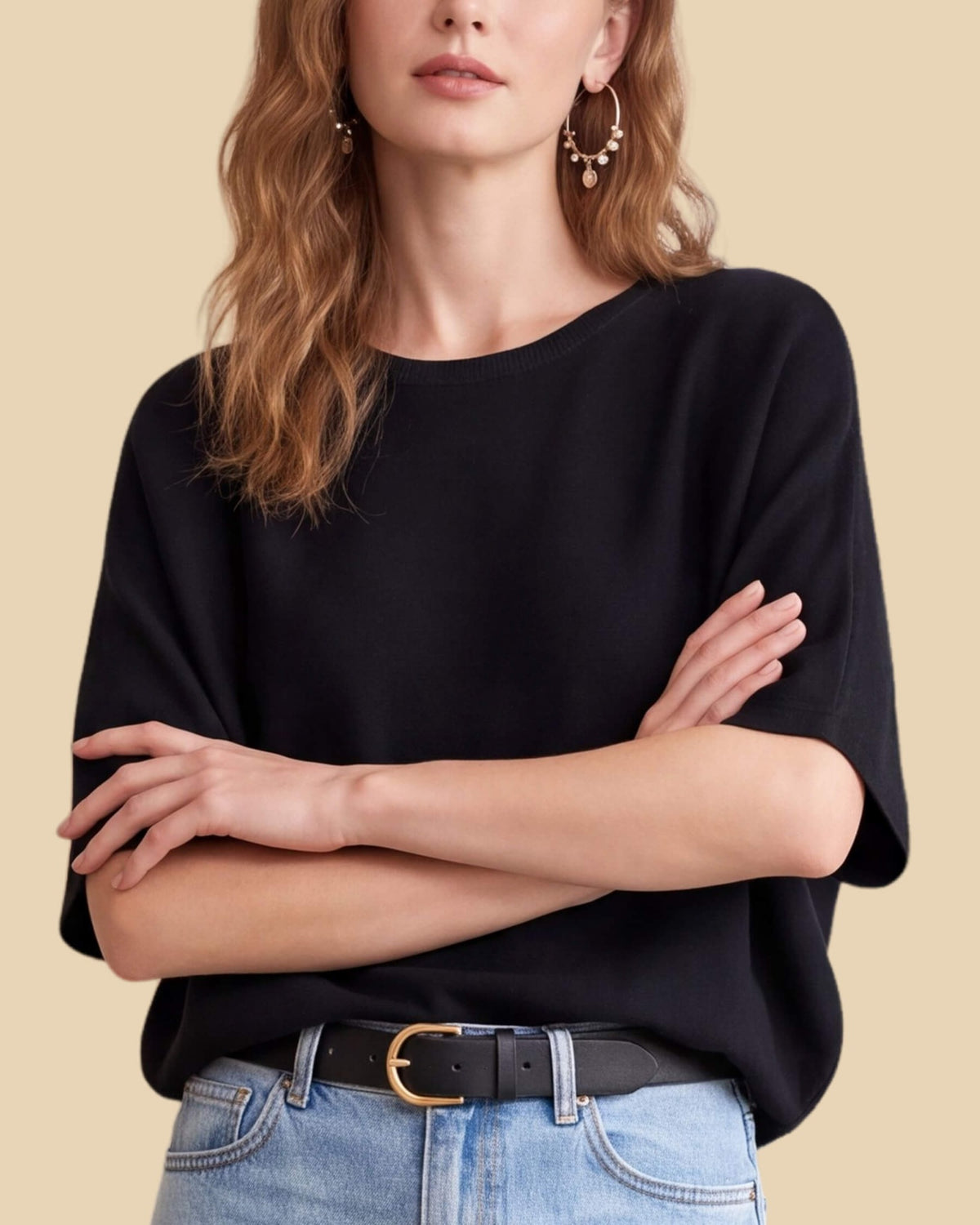 MoliSilk women's black merino wool short sleeve crew neck sweater, neckline and knit detail close-up