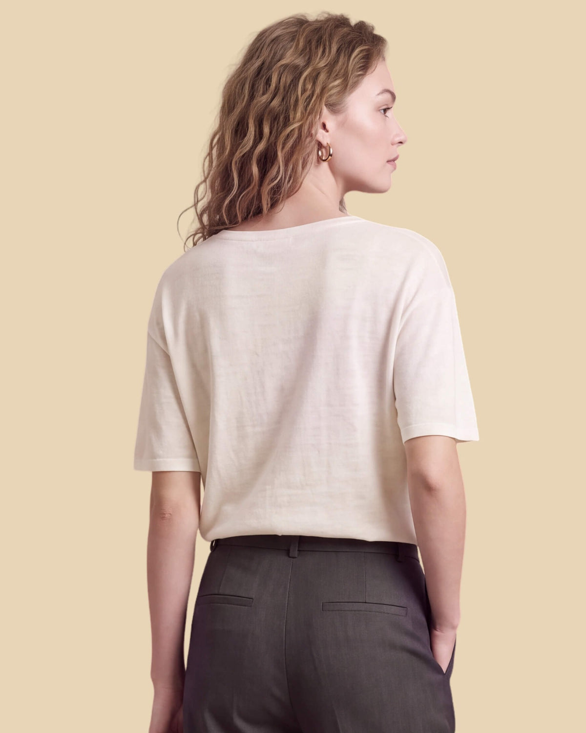 MoliSilk women's short sleeve crew neck sweater in off-white, back view