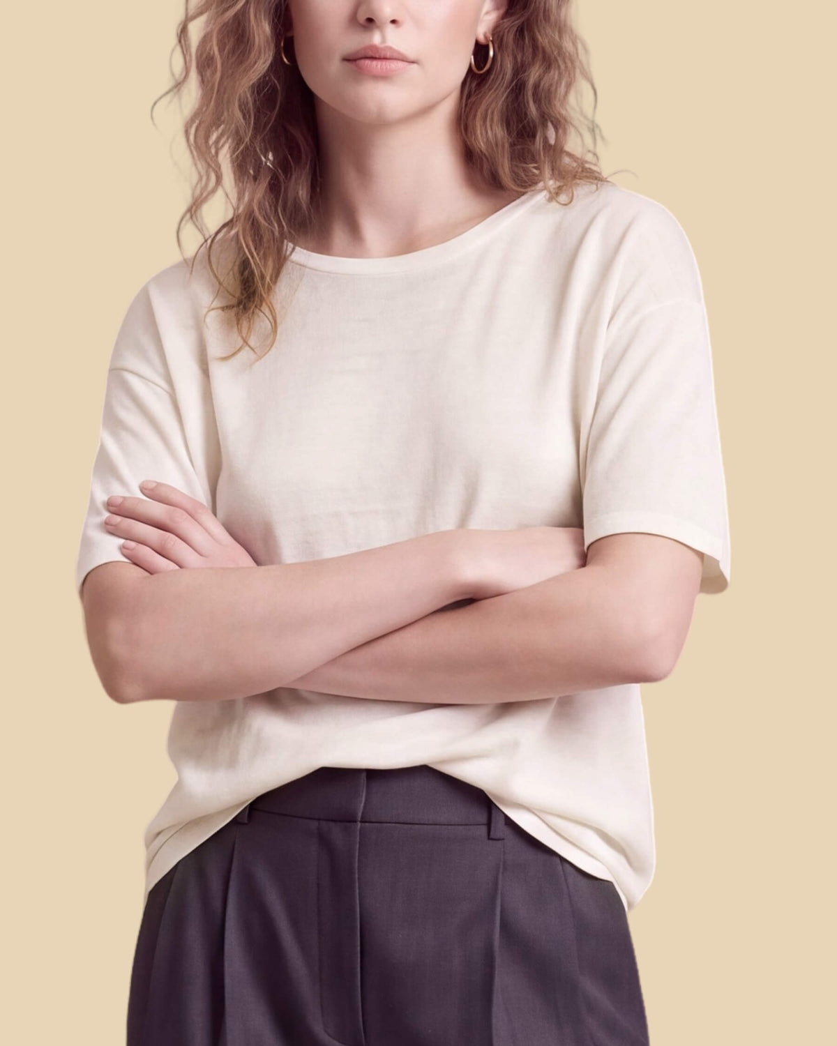 MoliSilk women's short sleeve crew neck sweater in off-white, crew neckline and sleeve detail close-up